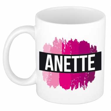 Naam cadeau mok / beker anette met roze verfstrepen 300 ml