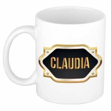 Naam cadeau mok / beker claudia met gouden embleem 300 ml