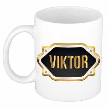 Naam cadeau mok / beker viktor met gouden embleem 300 ml